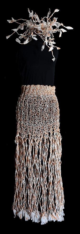 Dress composed of long skirt and collar made with the recycling of bags for "Conad". Thread made ​​by hand and worked with knitting and weaving.